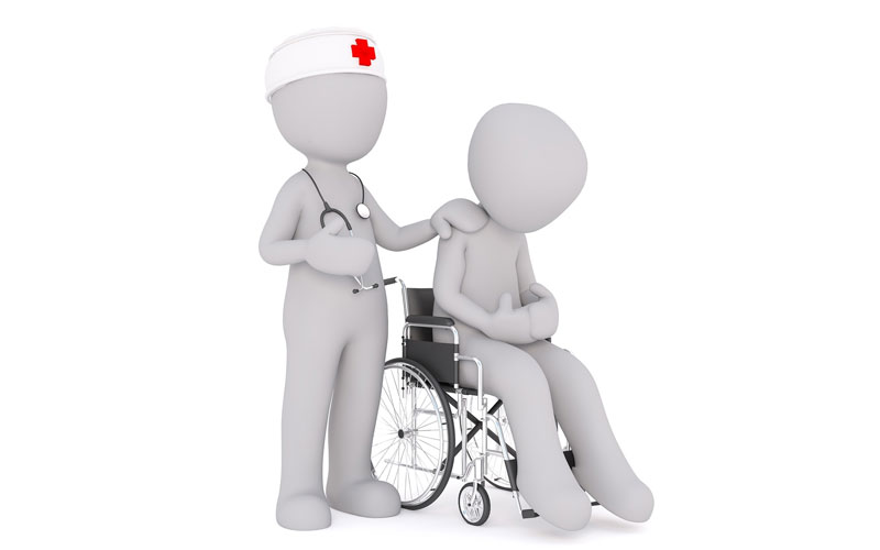 Doctor with patient in wheelchair